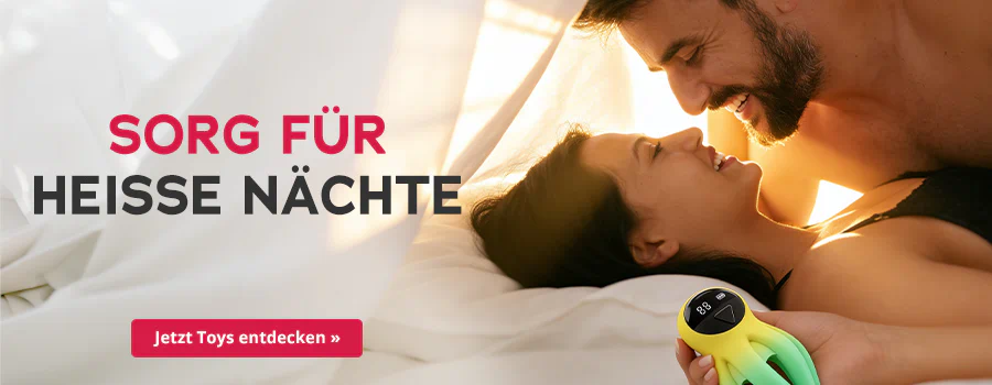 "Werbebanner mit lächelndem Paar im Bett und grün/gelben Toy in der Hand. Der Mann ist oberkörperfrei und die Frau trägt ein schwarzes Top.Text "Sorg für heisse Nächte" sowie Button "Jetzt Toys entdecken"