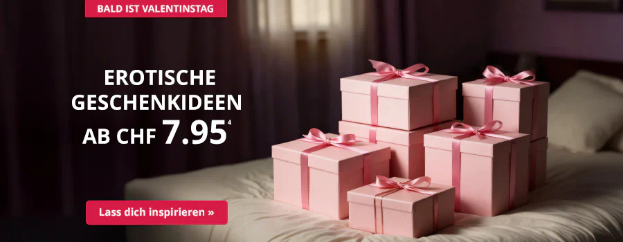 Rosa Geschenkboxen mit Schleifen auf einem Bett, Text: „Erotische Geschenkideen ab CHF 7.95“, Button „Lass dich inspirieren“, Hinweis auf Valentinstag.