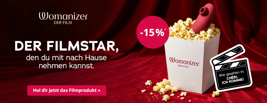 Ein roter Vorhang als Hintergrund mit einer Popcorn-Schachtel, in der ein rotes Womanizer-Produkt steckt, daneben eine Filmklappe mit dem Hinweis „Wie gesehen in: CHERI, ICH KOMME“. In einer pinken Kugel steht „-15%“. Links die Headline „DER FILMSTAR, den du mit nach Hause nehmen kannst.“ und unten ein roter Button „Hol dir jetzt das Filmprodukt »“.
